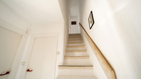 Stairs to upper bedroom
